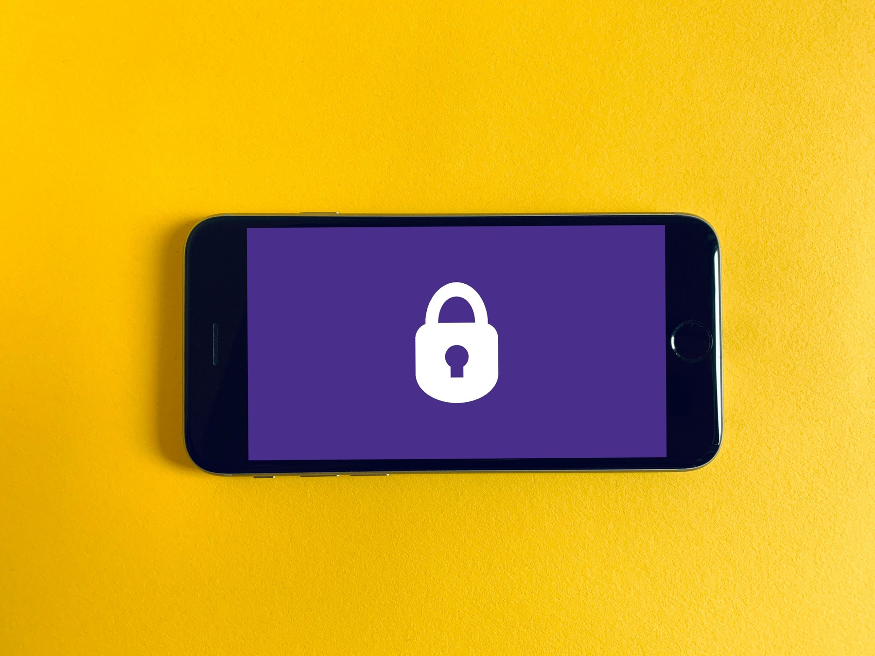 A phone displaying a lock icon, representing private health data.