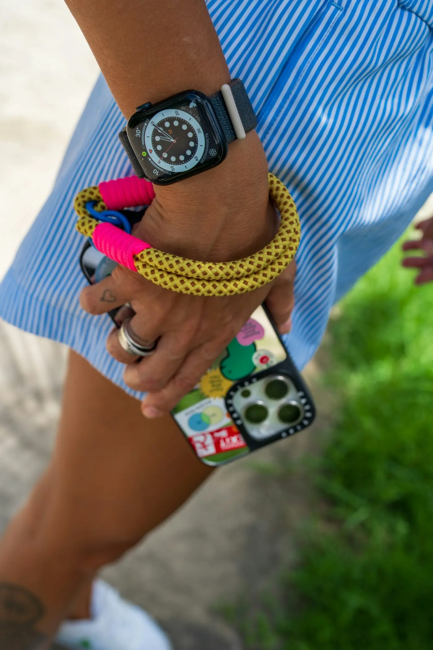 Apple Watch and phone health app view in natural light.